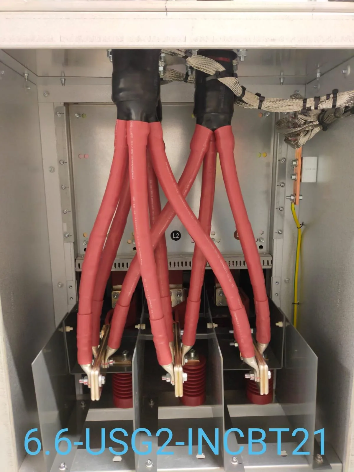 Cable jointer carrying out heat-shrink HV cable termination inside a tented work area